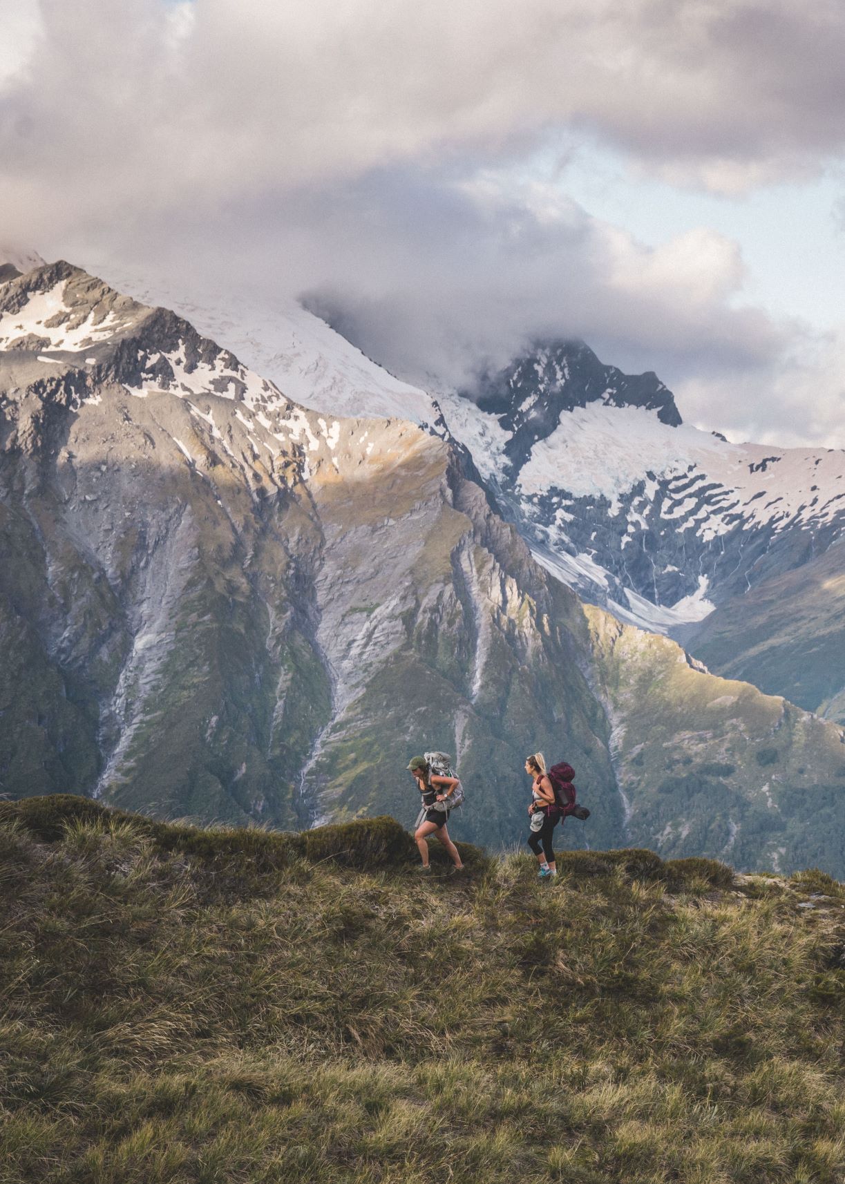 Hikers on hill in Mount Aspiring National Park