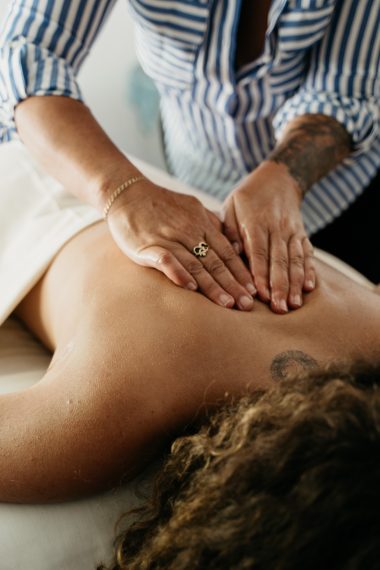 Girl getting a massage in wanaka new zealand